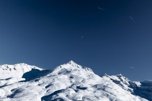 Air traffic over the ski station of Courchevel and the French Alps
